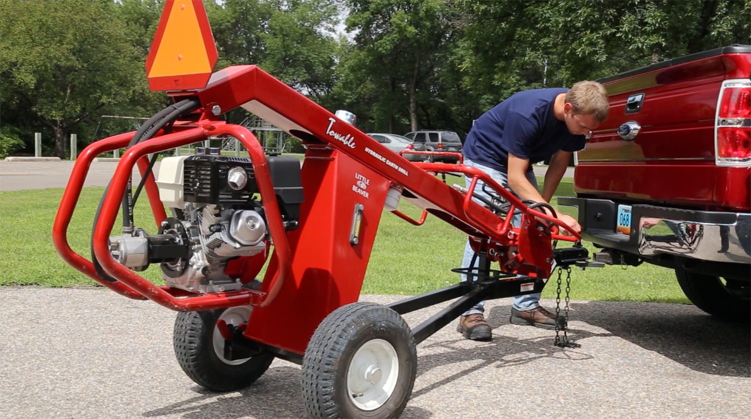 Towable earth drill transport Towable earth drill transport