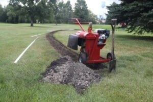 kwik trench mini trencher lays soil right next to cutting